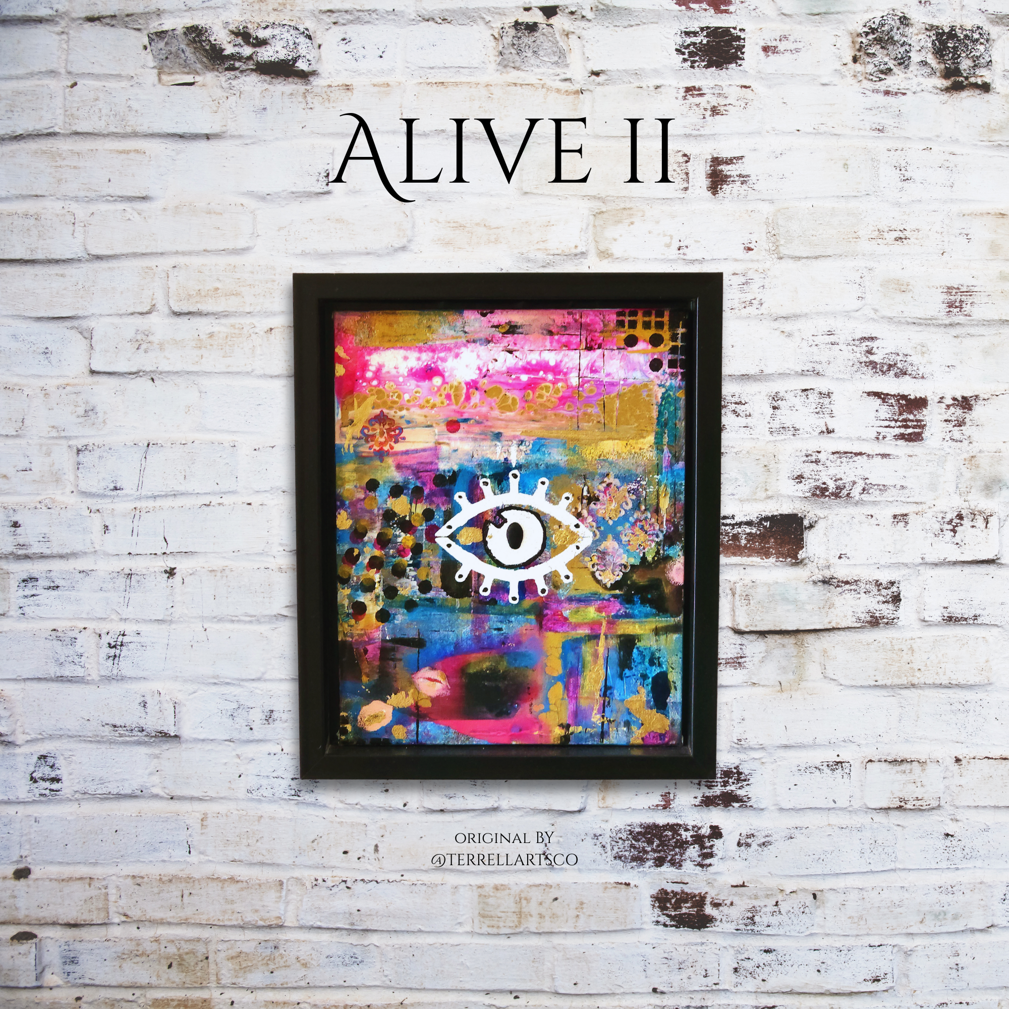 Framed abstract artwork with a colorful design and eye symbol on a white brick wall, featuring the text 'ALIVE II' and 'ORIGINAL BY @FERRELLARTCO'.